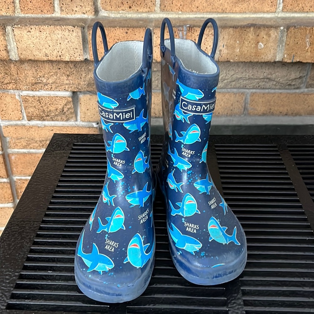 Shark print rain boots.